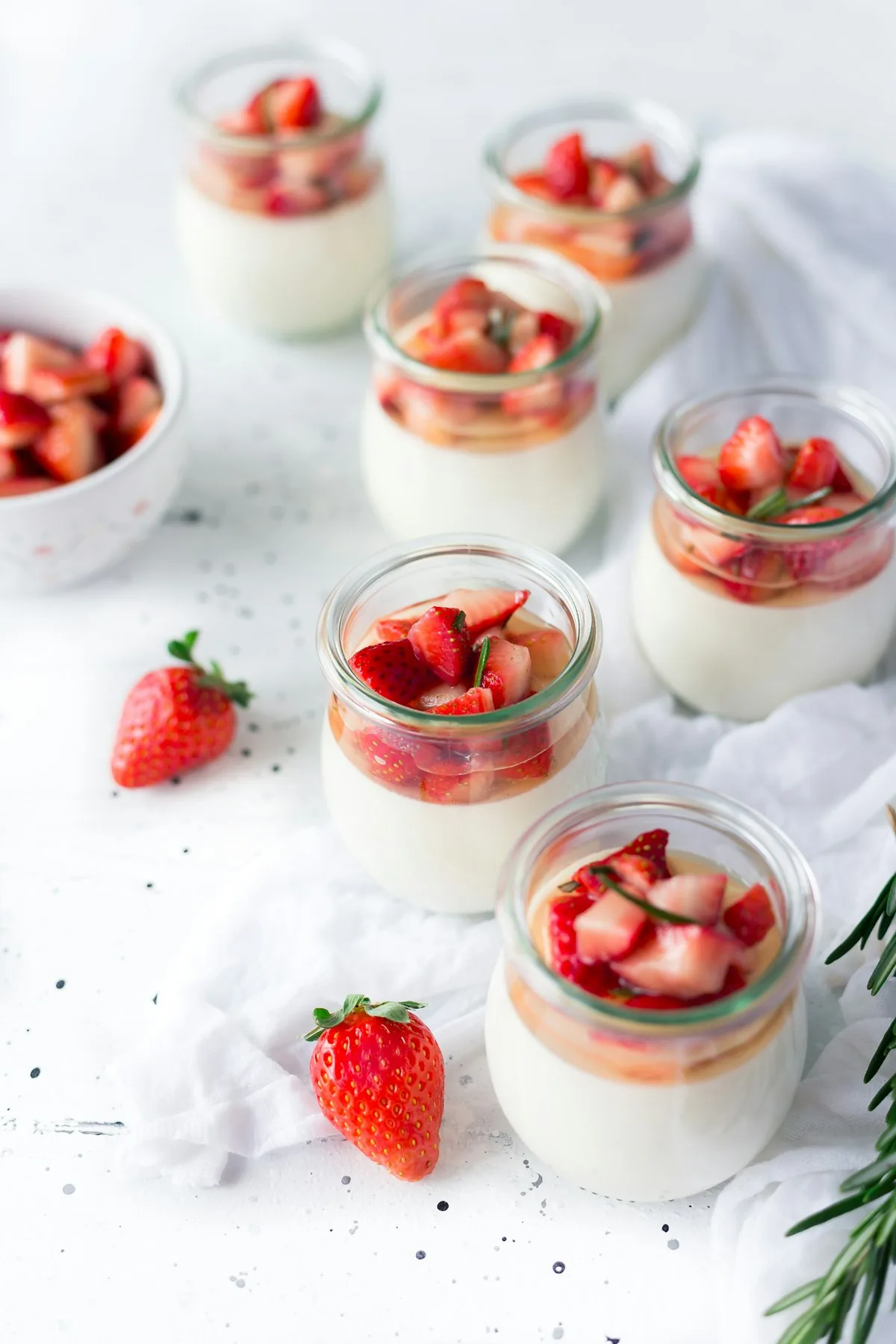 Rows of colorful yogurt cups in a supermarket dairy aisle