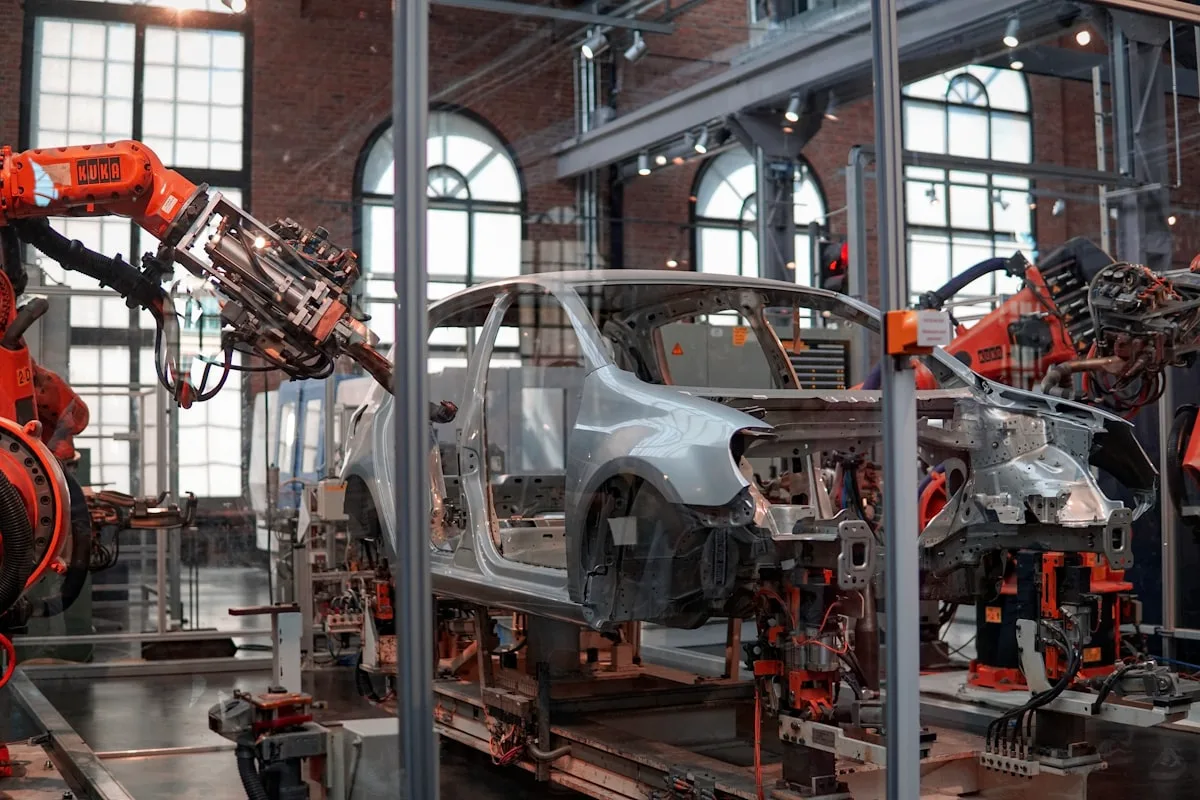 A large industrial flywheel in motion, representing stored momentum and continuous energy